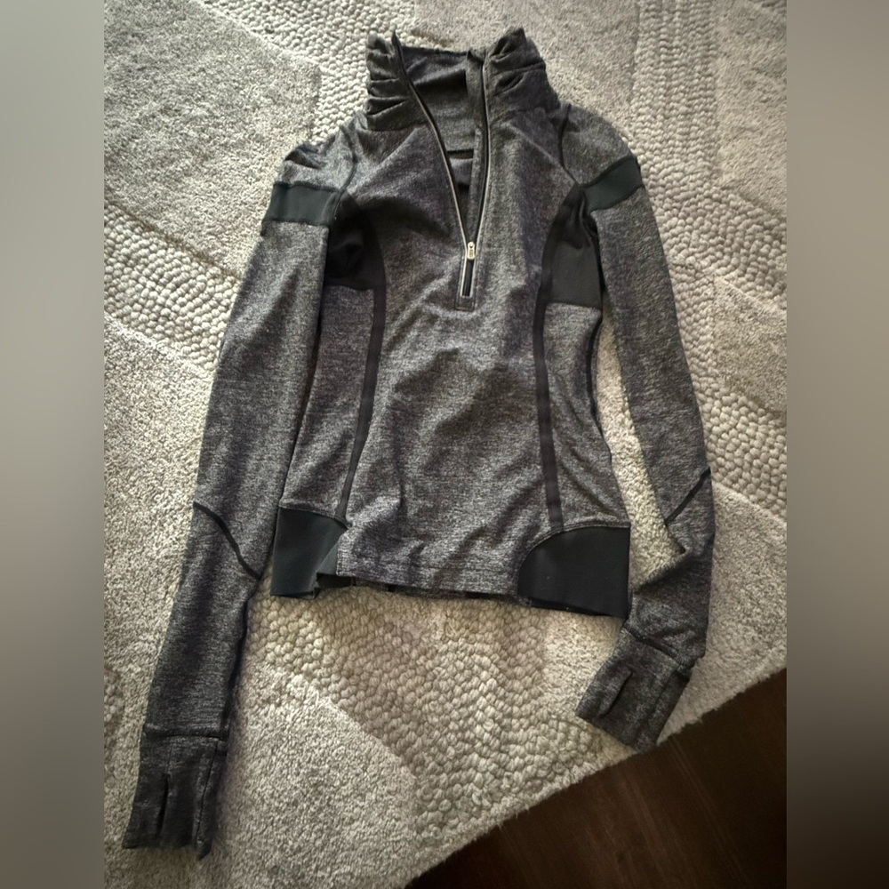 Lululemon quarter zip with thumb roles. Barely worn